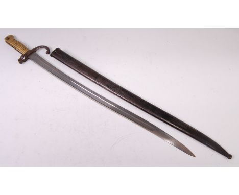 A French model 1866 Chassepot bayonet, having a 57cm singled edged fullered Yataghan shaped blade, hooked quillon and ribbed 