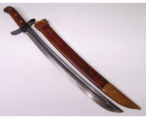 A WW II Japanese Heiho, converted from a Dutch Hembrug M1911 Klewang, having a 45.5cm single edged fullered blade stamped to 