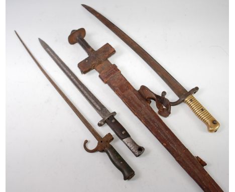 A French model 1886 bayonet, 63cm, together with a Czechoslovakian mauser bayonet, a French Chassepot bayonet and an Eastern 
