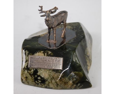 An Edwardian silver model of a stag, mounted on a polished hardstone base with presentation plaque, maker Levi & Salaman, Bir