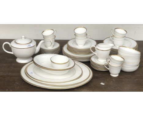 A Royal Worcester Viceroy part dinner service to include teapot, three graduating meat plates, teacups, saucers, etc