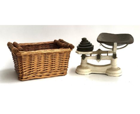 A set of vintage kitchen scales, with weights, together with two wicker baskets, the larger 41cmW 