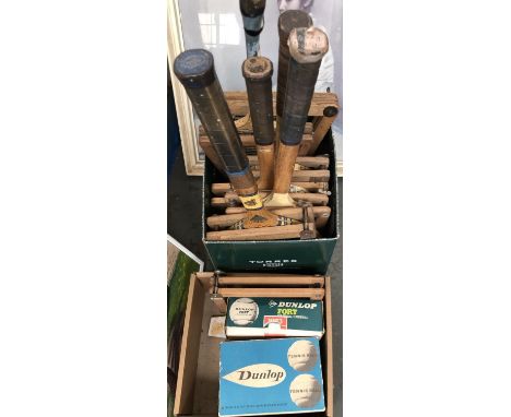A lot of vintage tennis rackets with clamps; together with various balls 