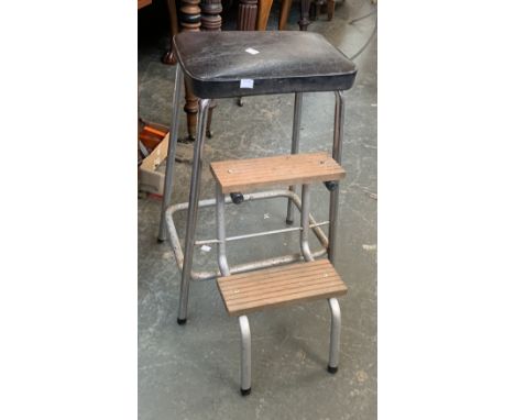 A vintage metamorphic stool with vinyl top, 59cmH 