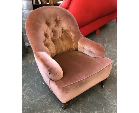 A Victorian buttonback armchair, on turned legs and ceramic casters, 71cmW 