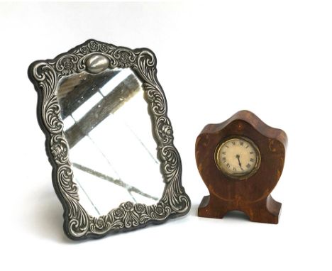 A white metal framed dressing table mirror, 27cmH; together with an HAC make German mantel clock with inlaid detail, 15cmH 