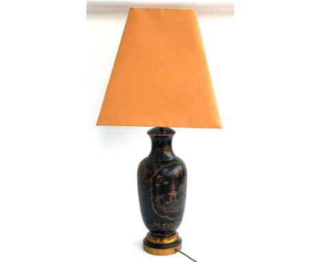 A ceramic japanned effect table lamp with peach coloured shade, 87cmH 