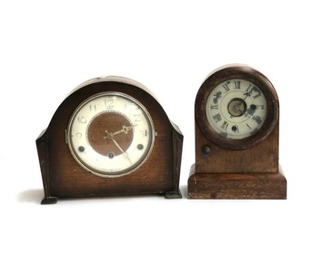 An Art Deco mantel clock, 22cmH; together with one other, 24cmH 