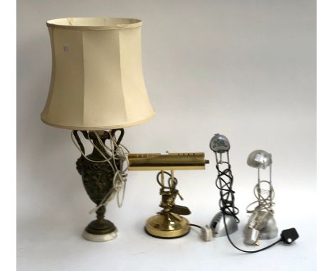 A large resin table lamp; a gilt metal desk lamp and two others 