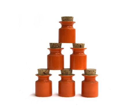 A lot of six orange ceramic Carlton, kitchen jars with cork stoppers, 8cmH 