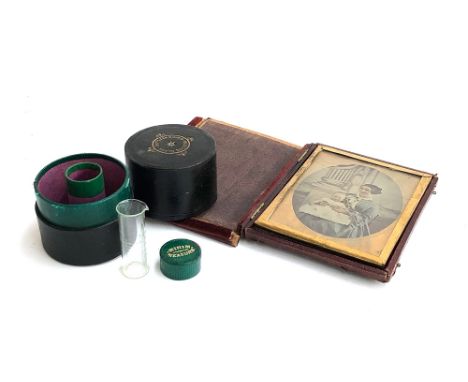 A Victorian Apothecary Minim measure in cylindrical morocco leather case; together with a cased daguerrotype portrait of a mo