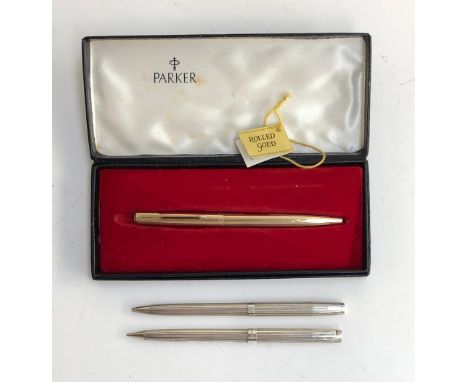 A Parker rolled gold ballpoint pen; together with a 925 silver pen and propelling pencil by Taylor Pen (3) 