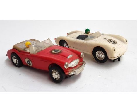 A Triang Scalextric Austin Healey 3000, tpogether with a Porsche C/92 