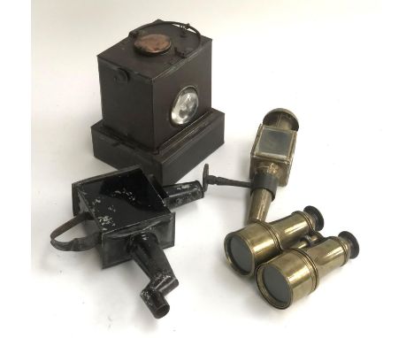 An antique railway lamp, glass lens intact, marked BR(M), 20cmH; together with a small brass carriage lamp, the steel bracket