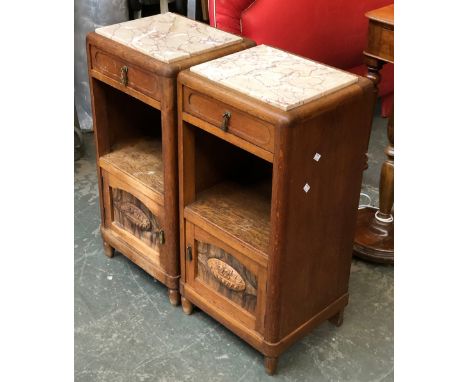A pair of 1930s art deco bedside tables, each with inset marble top, drawer over shelf and cupboard, 39x34x83cmH 