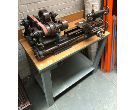 A metalworkers lathe, affixed to a scratch built bench, 92x50x107cmH 