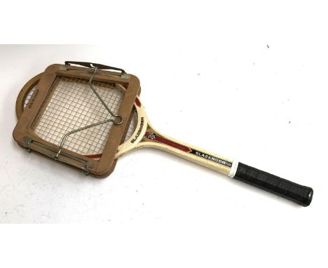 A vintage Slazenger tennis racket with Dunlop clamp 
