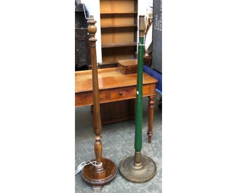 A green painted standard lamp with one other, each approx. 135cmH 