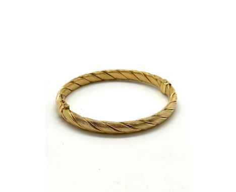 Ladies 9ct gold bangle total weight 10 grams