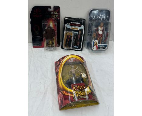 Selection of action figures toys in their original packaging to include Heros ' Series 1 Claire Bennet', ' Gollum Lord of the