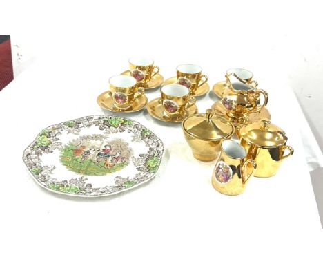German part tea service gold coloured porcelain and a collectors plate
