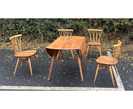 Ercol drop leaf table and four chairs measures approximately 28 inches tall x 44 wide x 48 deep