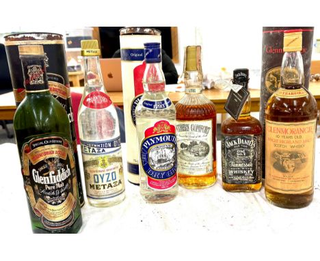 Selection sealed alcohol to include Glenmorangie 10 year old, Jack Daniels, Southern Comfort, Plymouth dry gin, Oyzo, Glenfid