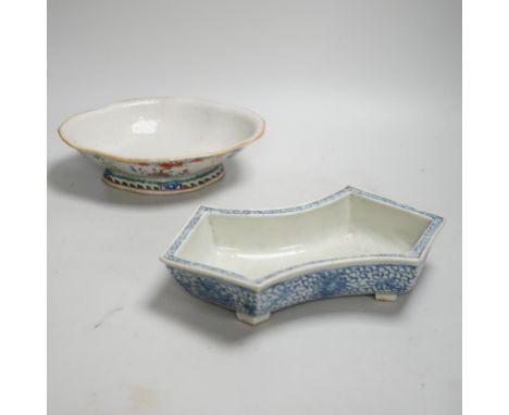 A 19th century Chinese blue and white ingot shaped dish and a famille rose footed dish, the largest 25cm wide (2) Provenance 