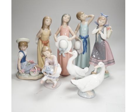 Six Lladro figures of girls, three with hats, one with a Teddy, two peasant girls with flowers and two Nao ducks, the largest