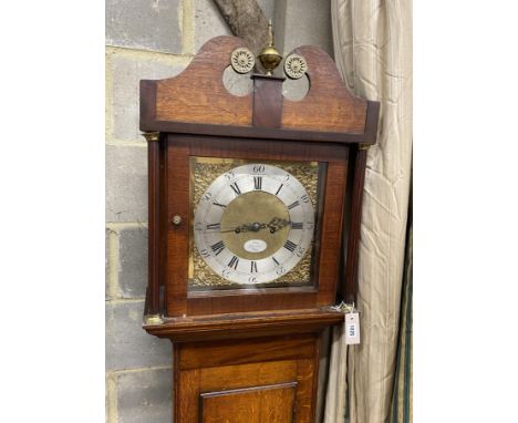 An early 19th century mahogany and banded oak eight day longcase clock marked Thomas Quested, Wye, height 206cm