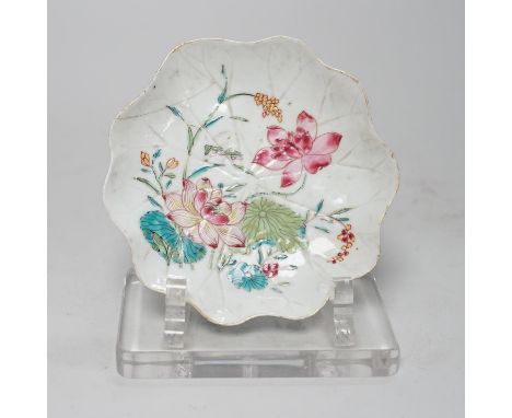 A Chinese famille rose lotus leaf shaped saucer dish, Qianlong period, 12.5cm Provenance - the vendor lived in Hong Kong in t
