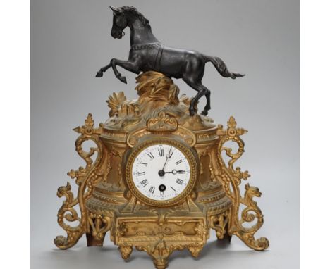 A late 19th century French gilt metal horse mounted clock, 35cm