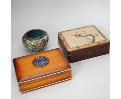 A group of Japanese lacquer boxes and two cloisonné enamel vases and a polished fossil