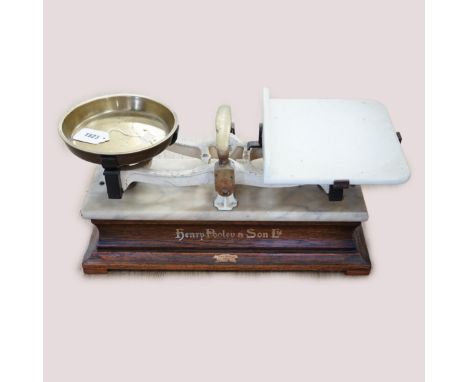 A pair of marble and brass shop counter scales, 53cm wide