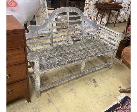A Lutyens style weathered teak garden bench, length 164cm, depth 50cm, height 103cm