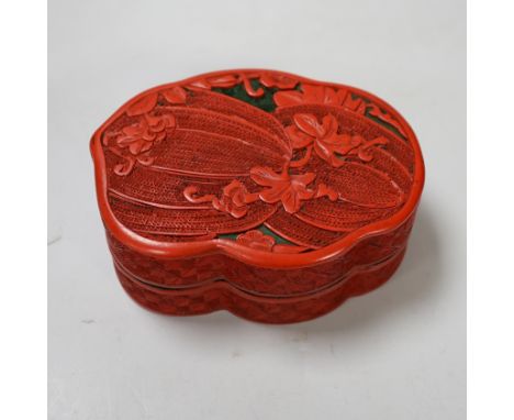 A Chinese cinnabar lacquer box and cover, decorated with bitter melons, 12cm high Provenance - the vendor lived in Hong Kong 