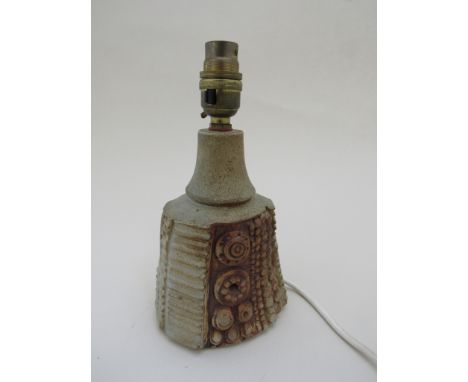 BERNARD ROOKE (b.1938):A studio pottery table lamp base, relief moulded wheels, dots and lines, 23cm high