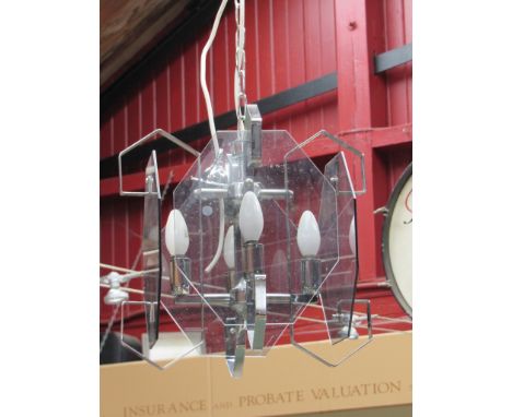 A smoked glass and chrome ceiling light on chrome chain with four branches, 35cm tall 