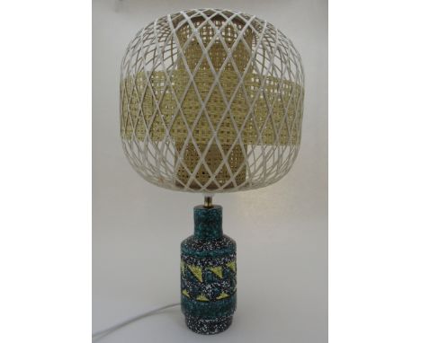 An Italian 1950's pottery lamp base with rafia shade, stamped 35/67