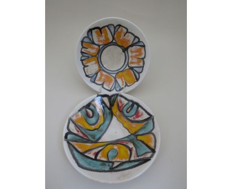 A pair of Poole Delphis bowls with white ground and yellow, red and green detail, (one with hairline), shape 57, 27cm diamete