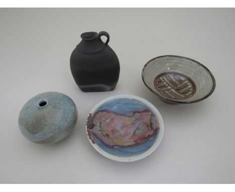 Four items of studio pottery including a Colin Kellam dish, David Walters dish, Pauline Ashley raku flask and a crackle glaze