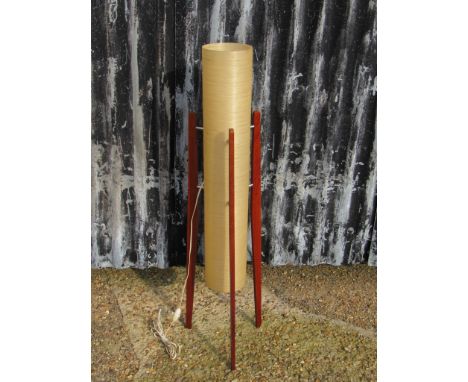 A spun resin rocket lamp on teak legs, ivory coloured shade 