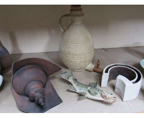 A 'John Higgens' studio ceramic stylised planter, urn form planter, unmarked, a studio ceramic trout and a beer flagon.