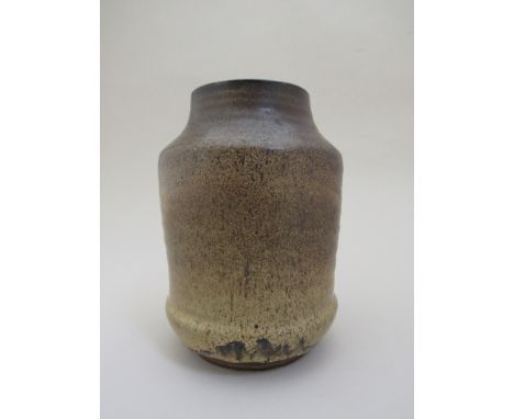 A Carter Stabler Adams Poole vase circa 1925-34 with mottled caramel and brown glazes. Stamp No.21, Swastika and incised shap