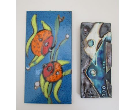 A West German Schaffenacker 490 ceramic wall tile and one other, both with fish detail, largest 30cm x 15cm