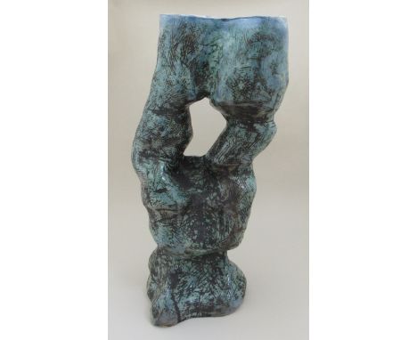 A circa 1960's ceramic abstract sculpture of two figures facing each other, unmarked 70cm high