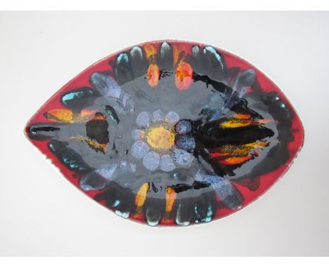 A Poole Delphis tear form dish, red ground with black, yellow and orange glazes, 30cm x 20cm, no decorators mark 