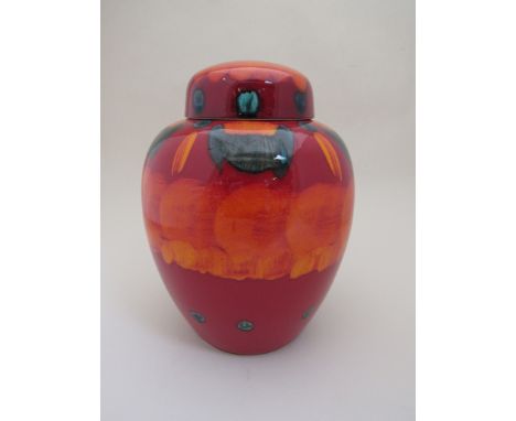 A Poole Pottery volcano range ginger jar, red/orange tones, indigo interior, by Maxime Clarke, 32cm high 