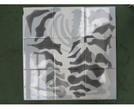 A tile panel by Hereford Tiles Ltd with printed skeletal design (one a/f)