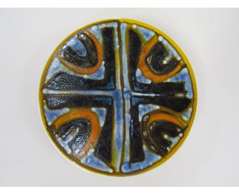 A Poole Delphis dish, blues and black with orange detail. Blue back stamp. 27cm diameter.